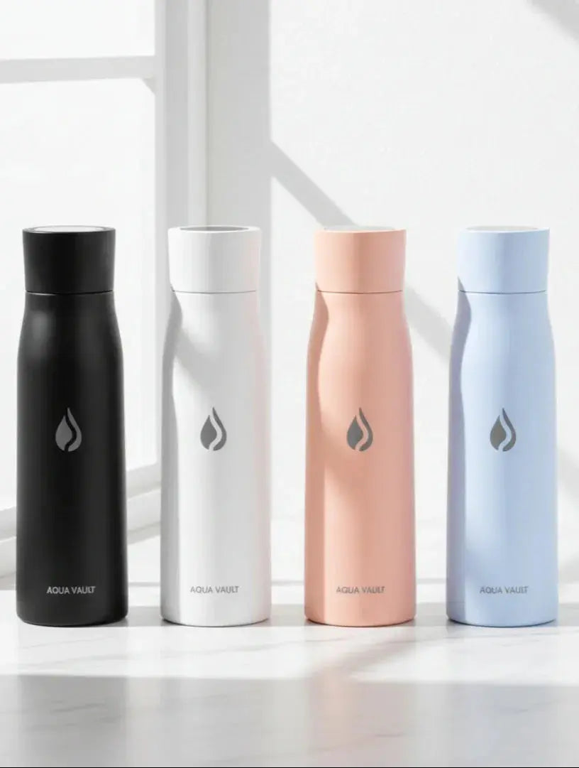 AQUA VAULT insulated water bottles in black, white, pink, and blue on a white surface