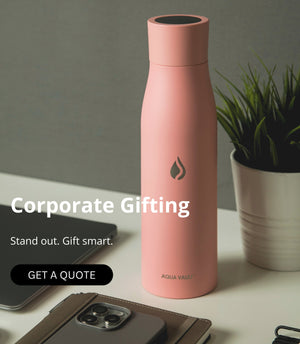 AQUA VAULT PureX Bottle Himalayan Pink on a desk with 'Corporate Gifting' text.