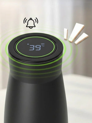 Black AQUA VAULT Bottle with digital temperature display on a white background