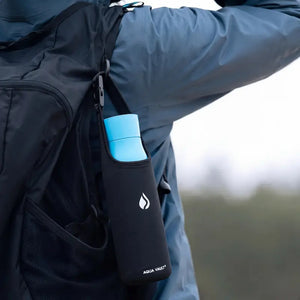 AQUA VAULT PureX travel sleeve with blue smart water bottle attached to backpack