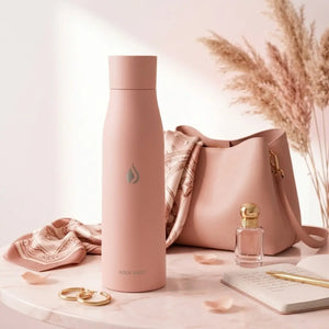 AQUA VAULT PureX UV-C self-cleaning smart water bottle in pink lifestyle