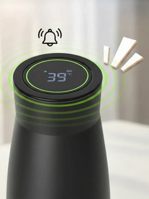 Black AQUA VAULT PureX UV-C Self-Cleaning Premium Smart Water Bottle with hydration reminders feature on a white background