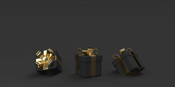 AQUA VAULT Black Friday Sale - Three black gift boxes with gold accents on a dark background.