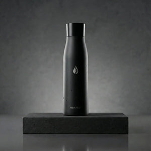 Shadow Black AQUA VAULT PureX  Self-cleaning Smart Water Bottle with a logo on a dark gray background