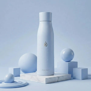 Tidal Blue AQUA VAULT PureX  Self-cleaning Smart Water Bottle with a logo on a light blue background
